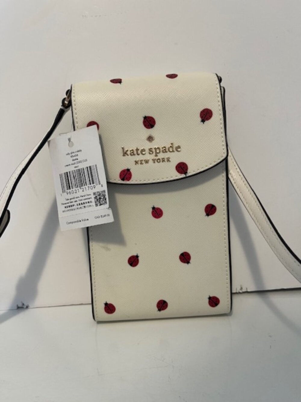 Kate Spade New York phone crossbody bag.
